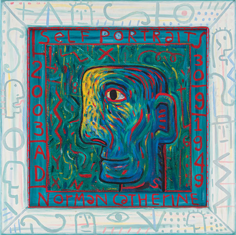 A blue and red square with a painting of a face. Description generated by AI