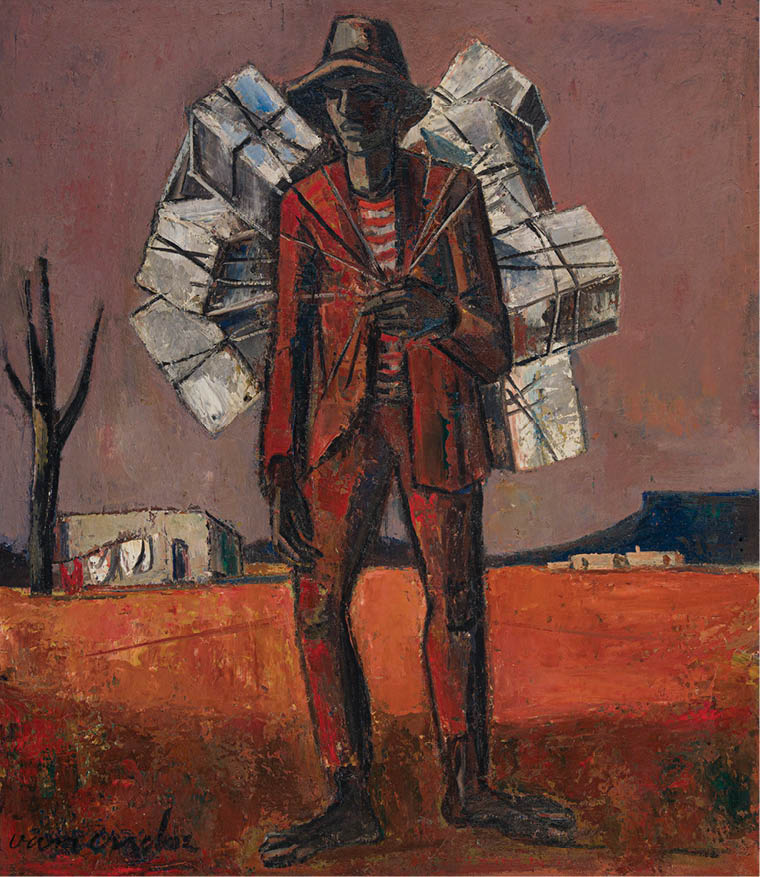 A man wearing a red jacket and a hat is holding a large stack of boxes. Description generated by AI