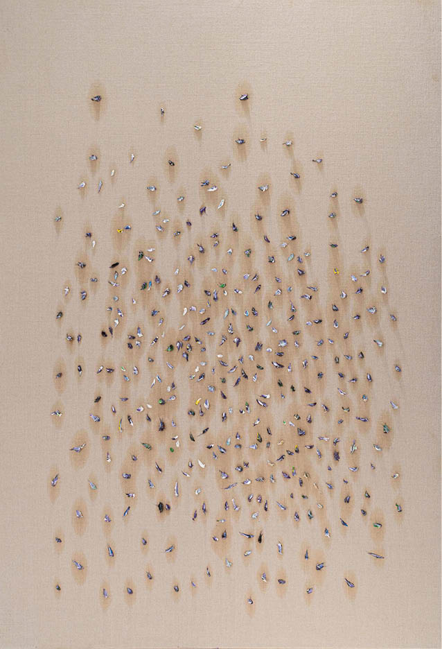 A white cloth with many blue and yellow dots. Description generated by AI