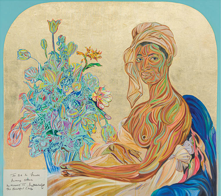 A woman is sitting in front of a bouquet of flowers. Description generated by AI
