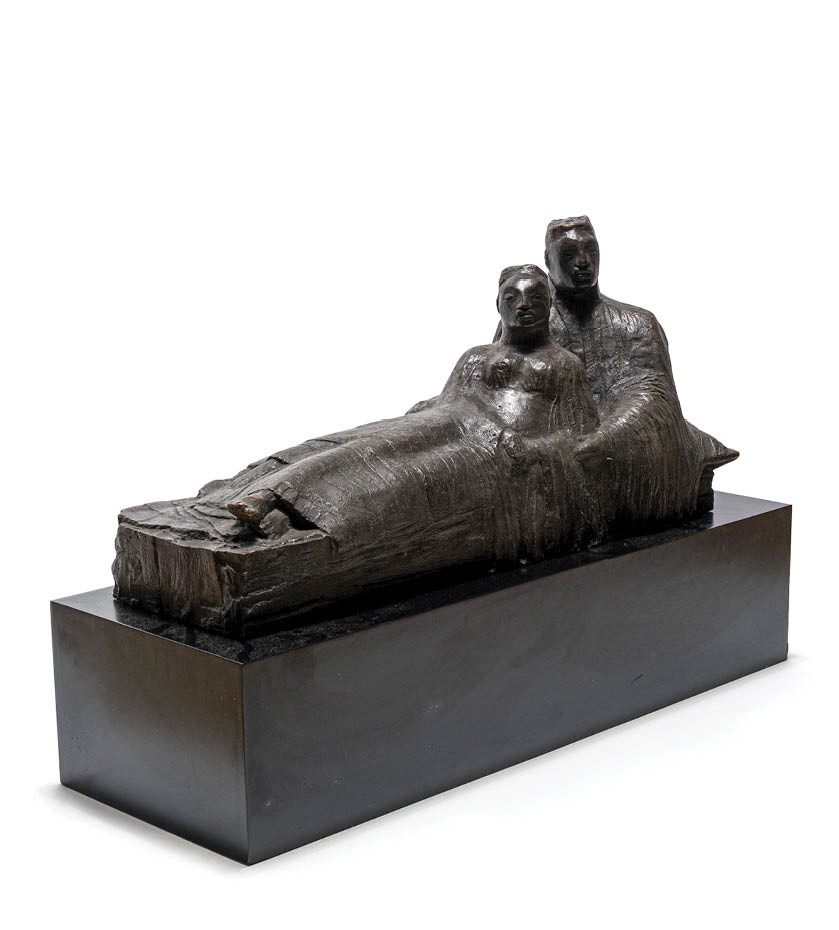 A statue of a man and woman lying together. Description generated by AI