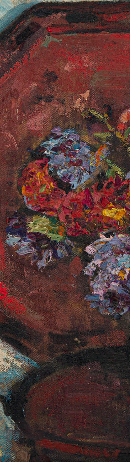 A red box with a vase of flowers in it. Description generated by AI