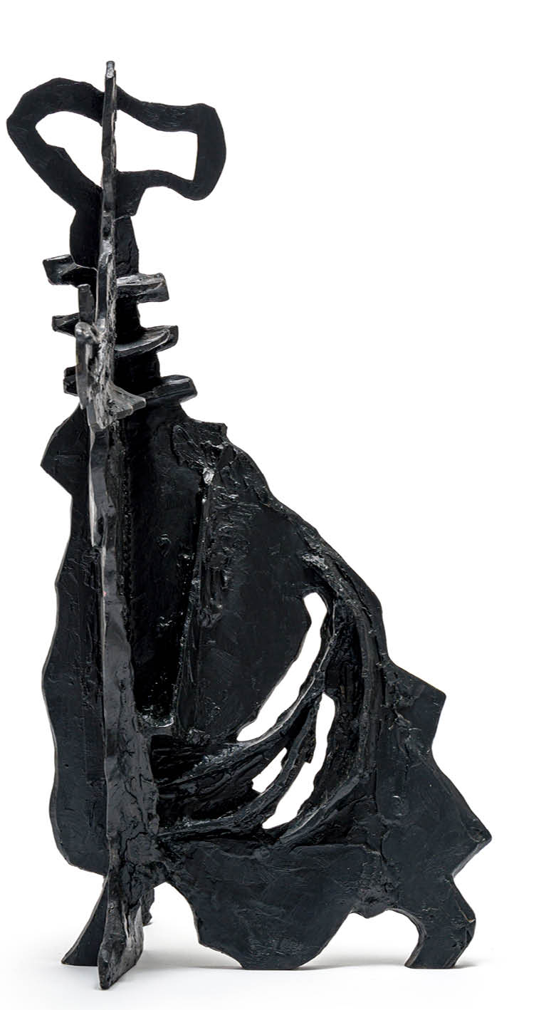 A statue of a man holding a cane. Description generated by AI
