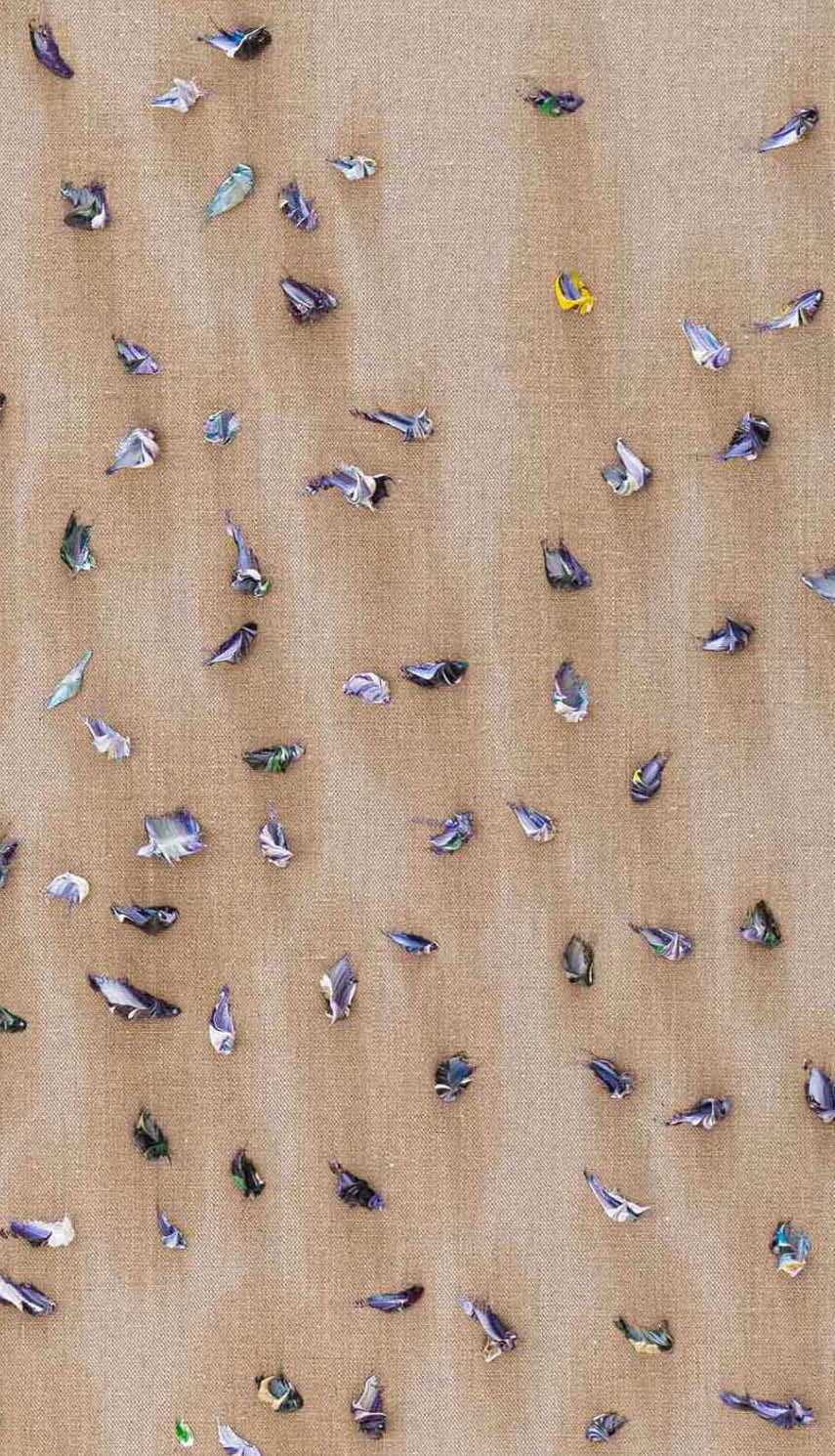 A white cloth with many blue and yellow dots. Description generated by AI