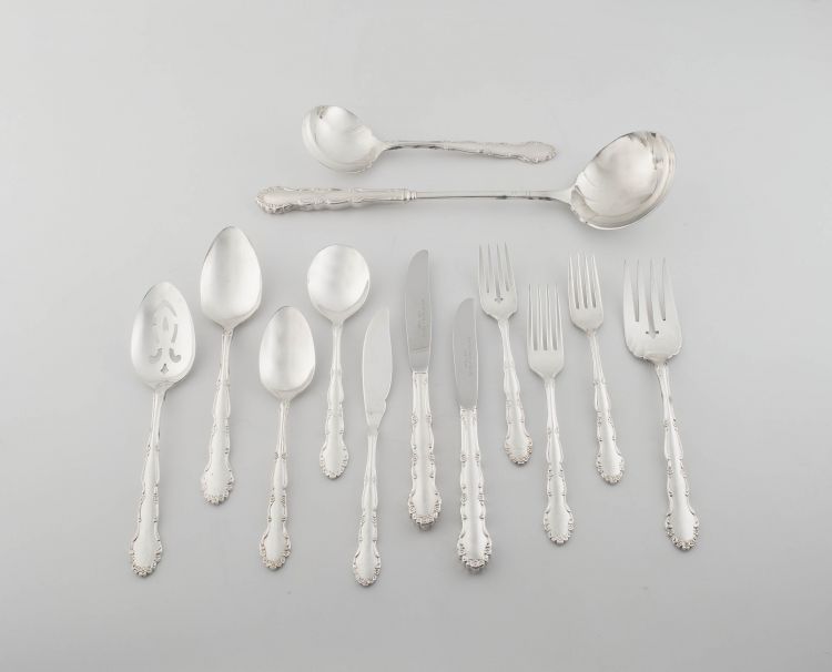 A set of Oneida silver-plate Flirtation pattern flatware, retailed