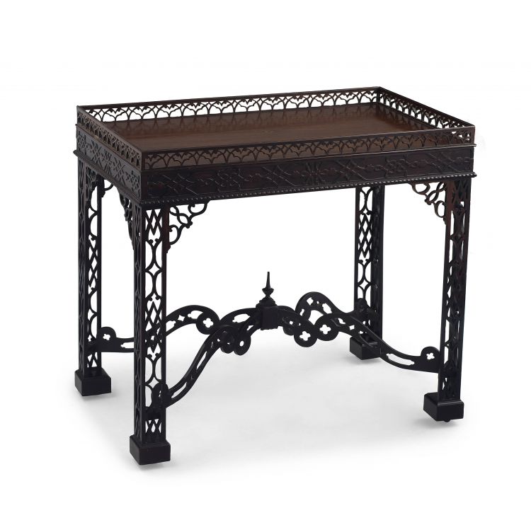 A George III style carved mahogany silver table, 19th century