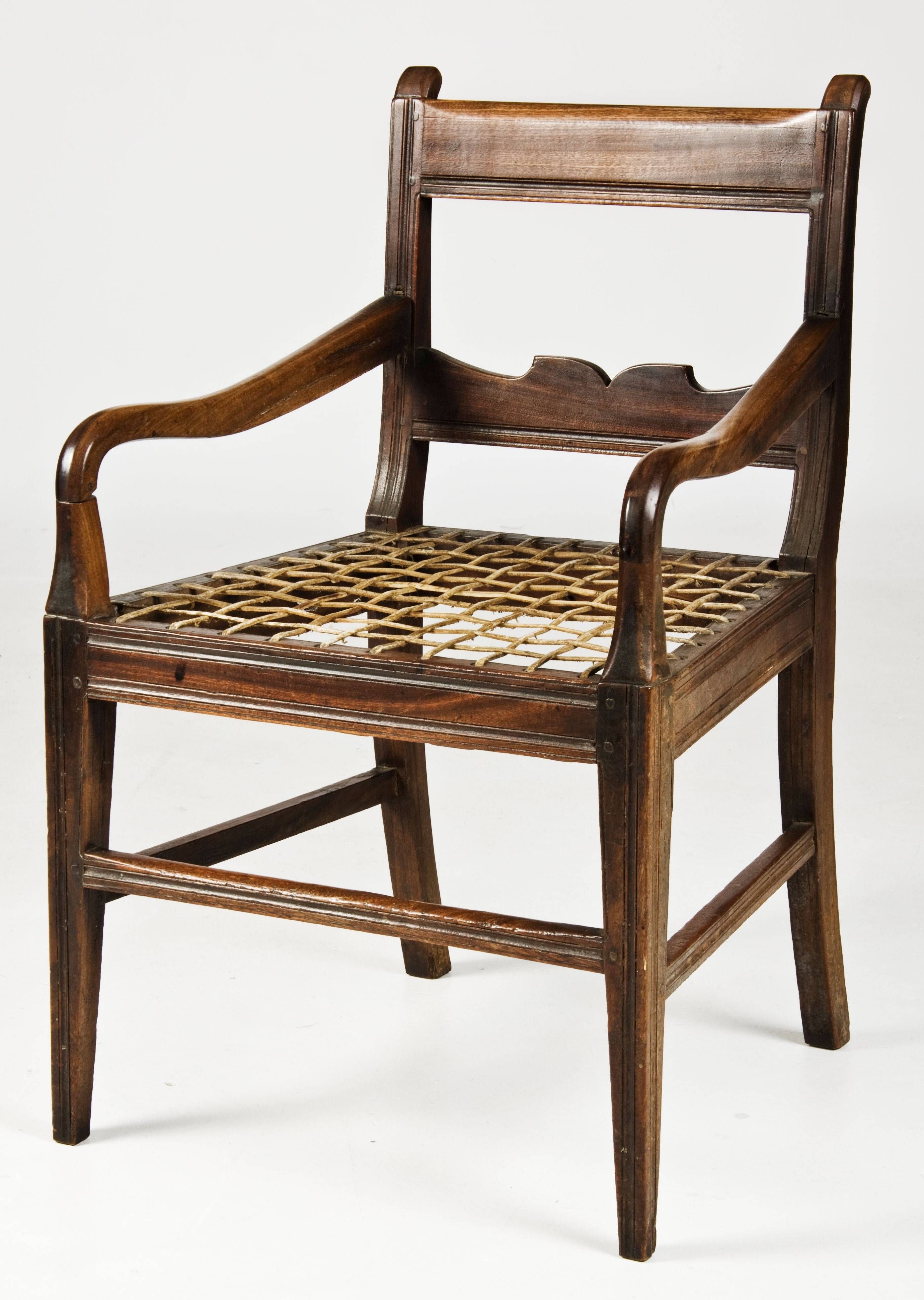 A Cape stinkwood armchair, 19th century Strauss & Co
