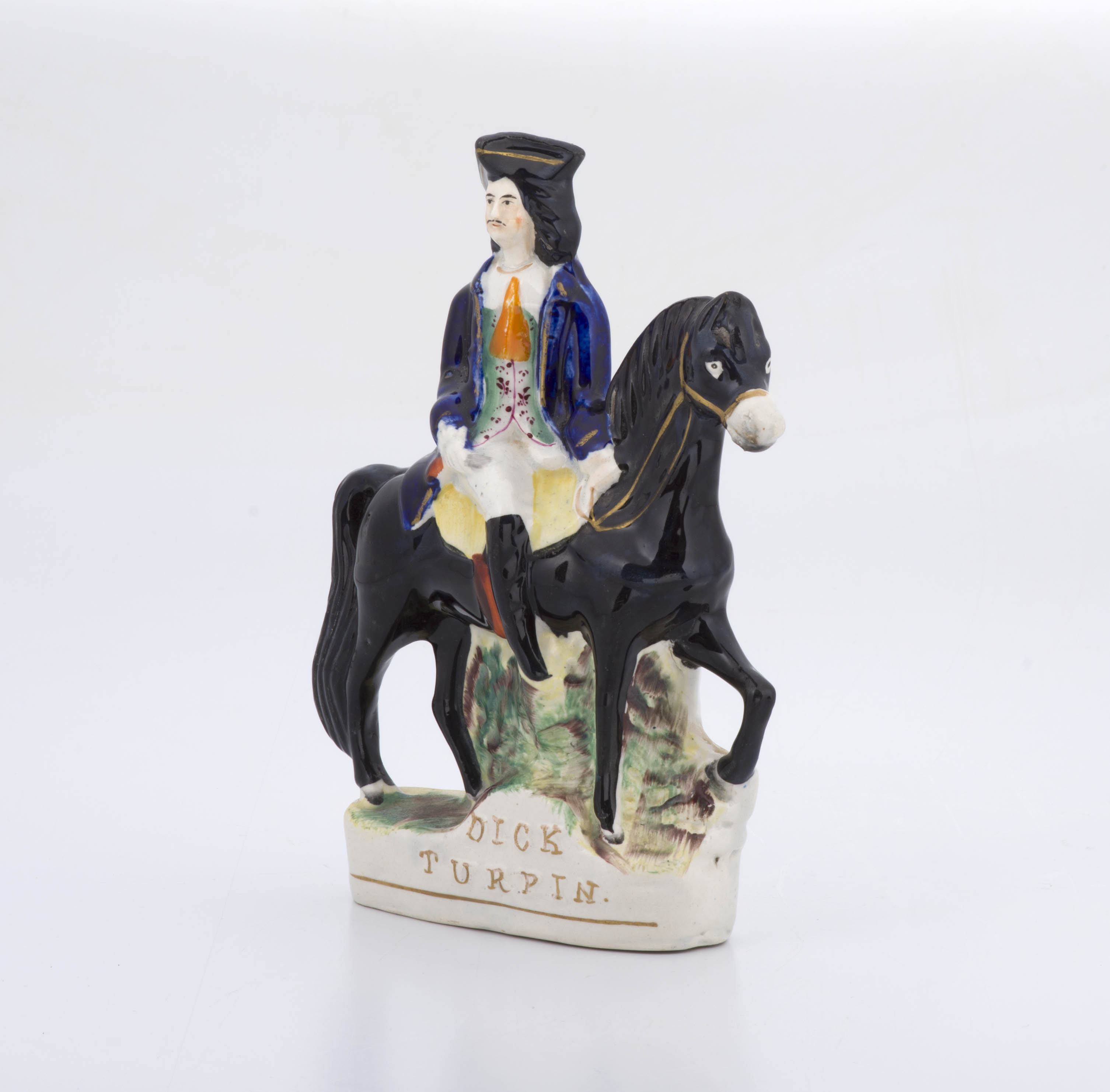 A Victorian Staffordshire figure of Tom King