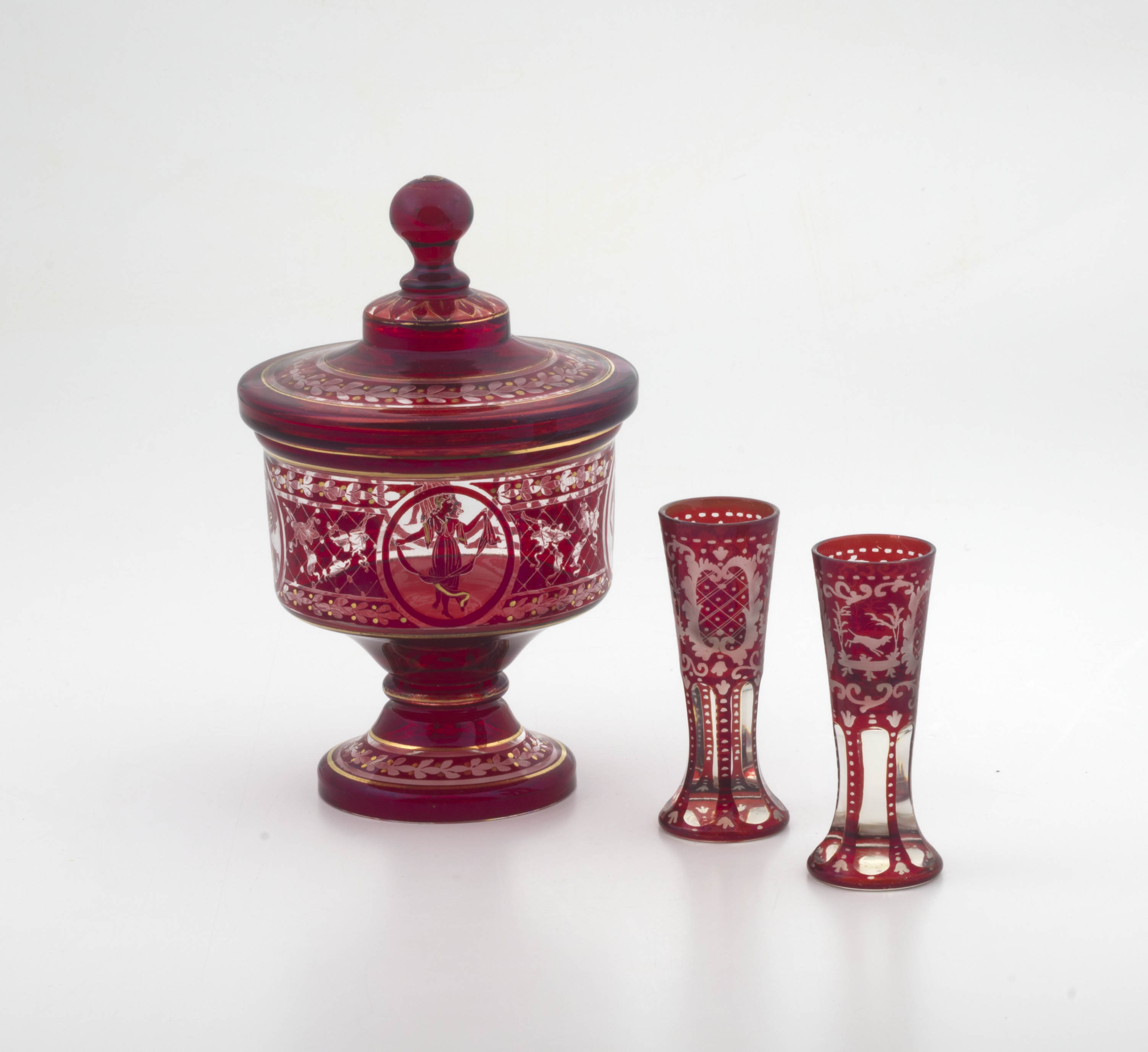 A pair of Bohemian ruby-flashed and clear glass toasting glasses, late 19th century