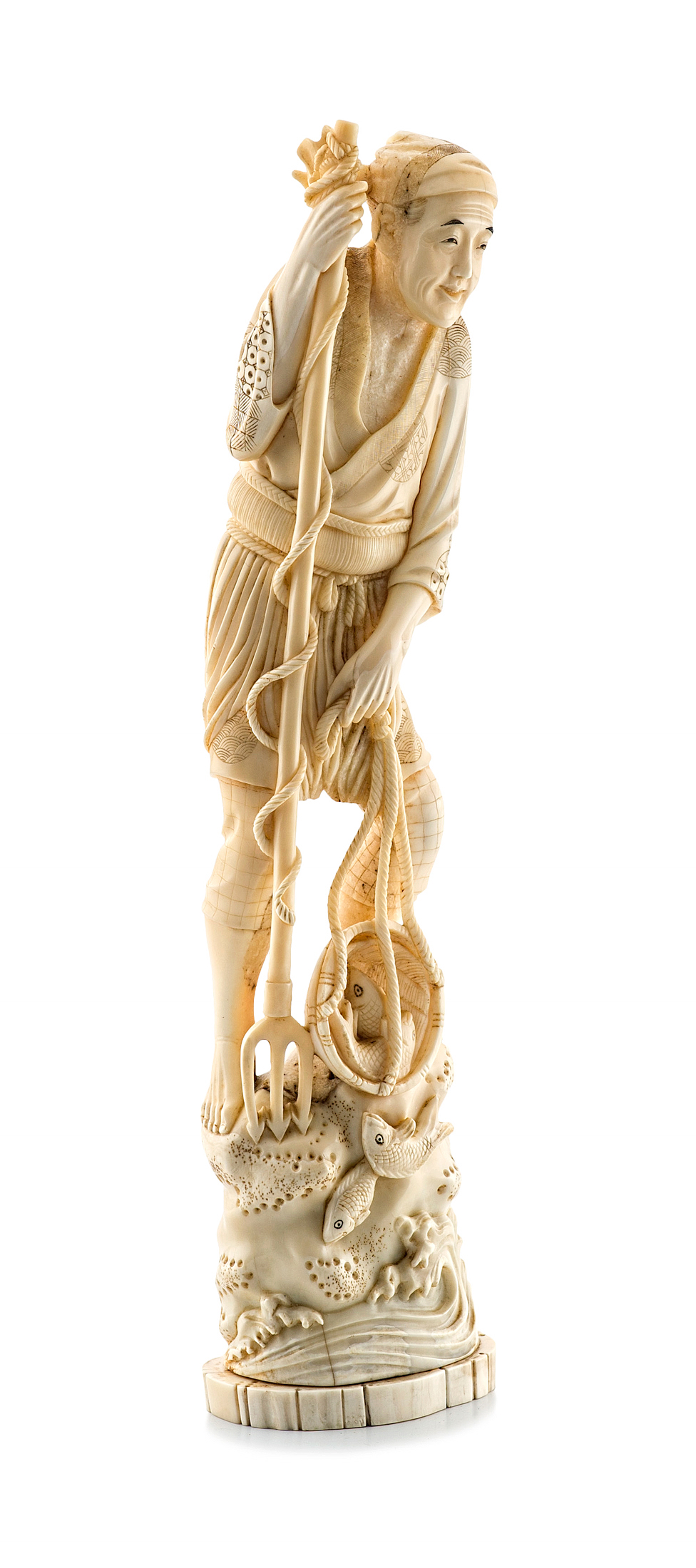 A Japanese ivory carving of a fisherman, Meiji period (1868-1912)