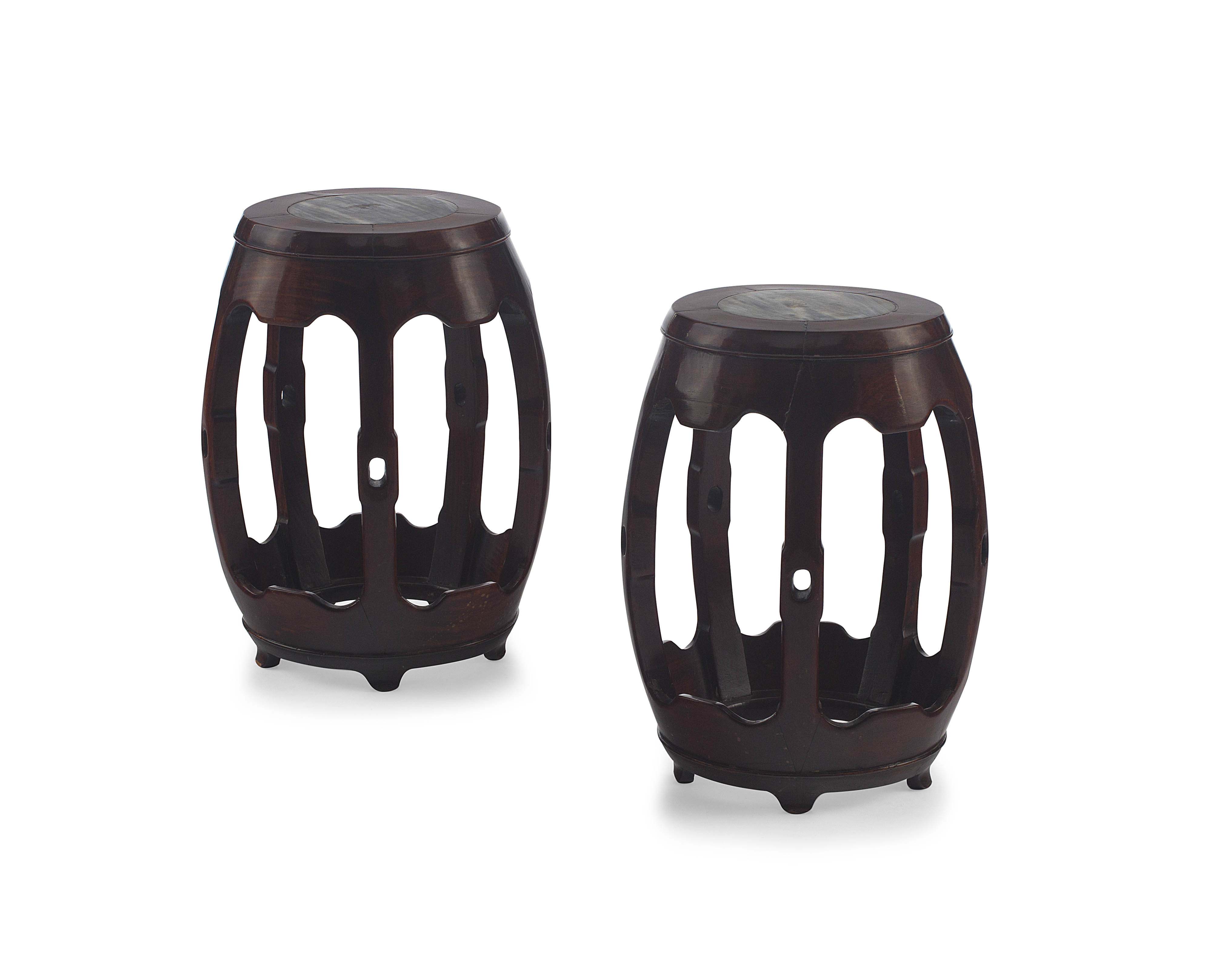 A pair of Chinese hongmu and marble inlaid drum stools, Qing Dynasty, 19th century