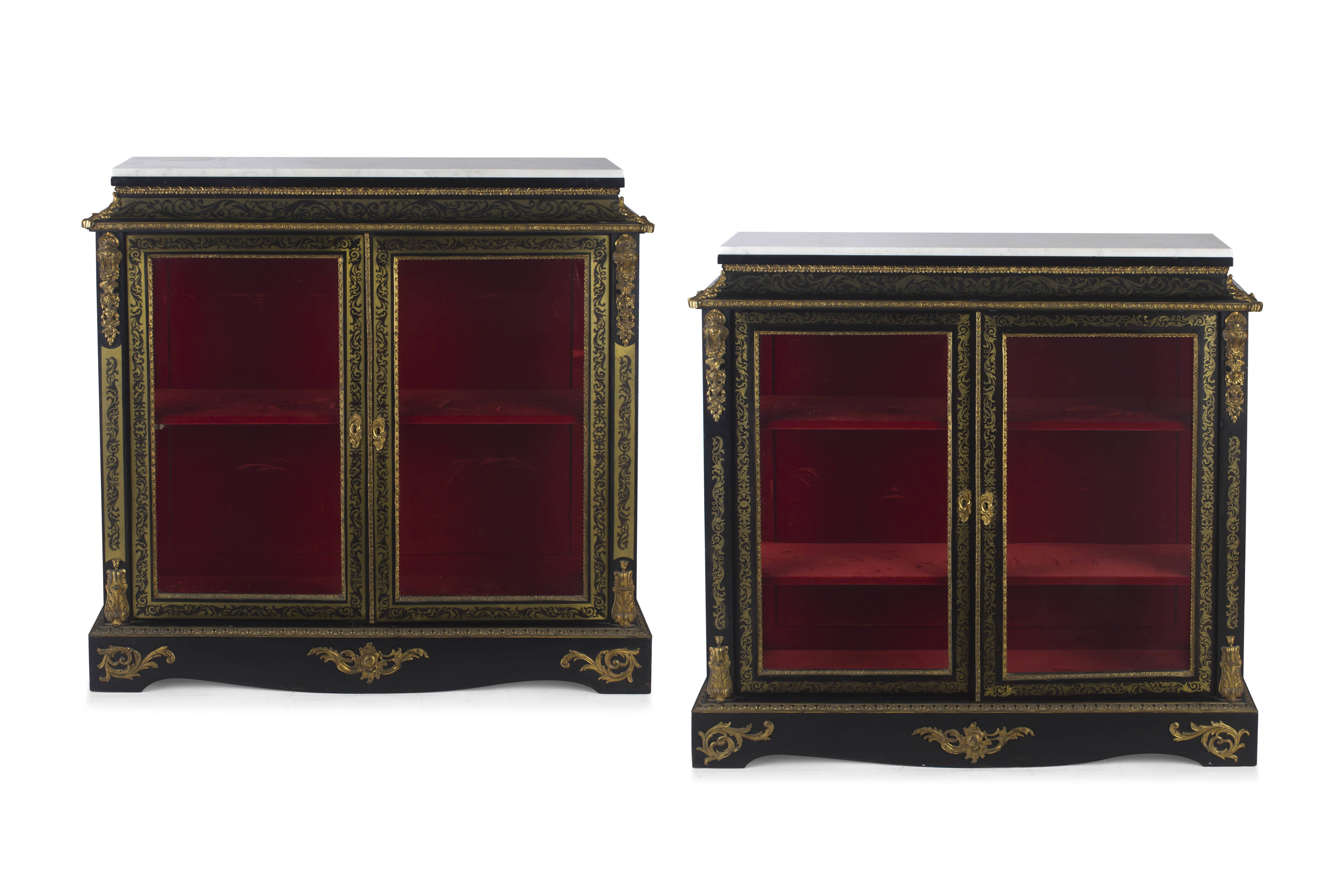 A pair of Louis XVI style ebonised and ormolu-mounted boulle side cabinets, 19th century