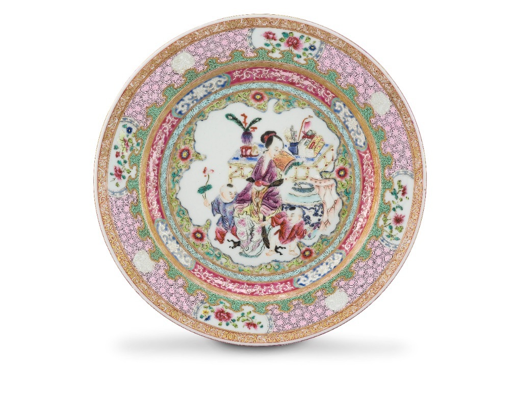 A Chinese famille-rose ruby-back 'Lady and Boys' plate, Qing Dynasty, 19th century