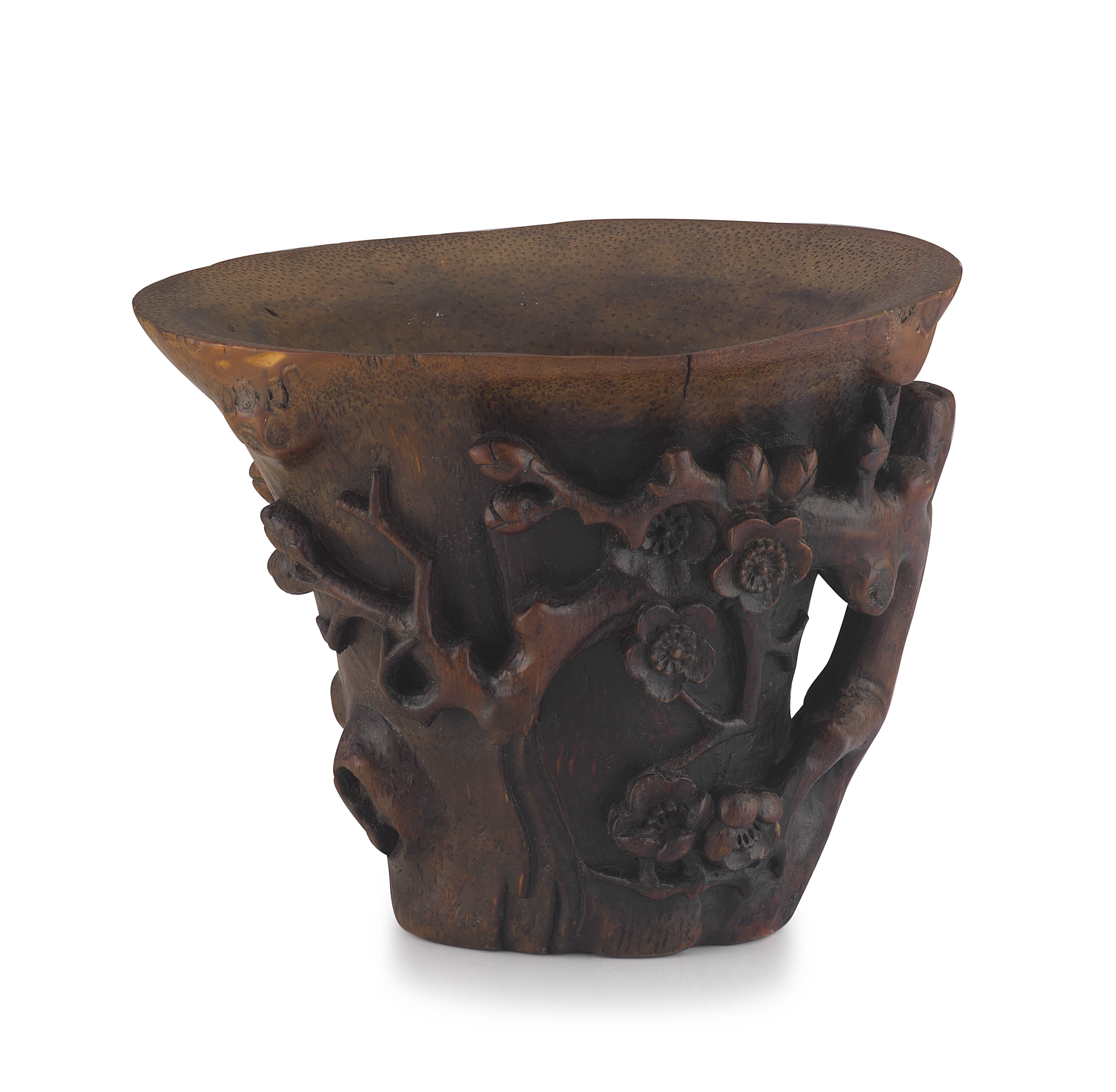 A Chinese carved bamboo 'peony' libation cup, Qing Dynasty, 18th/19th century