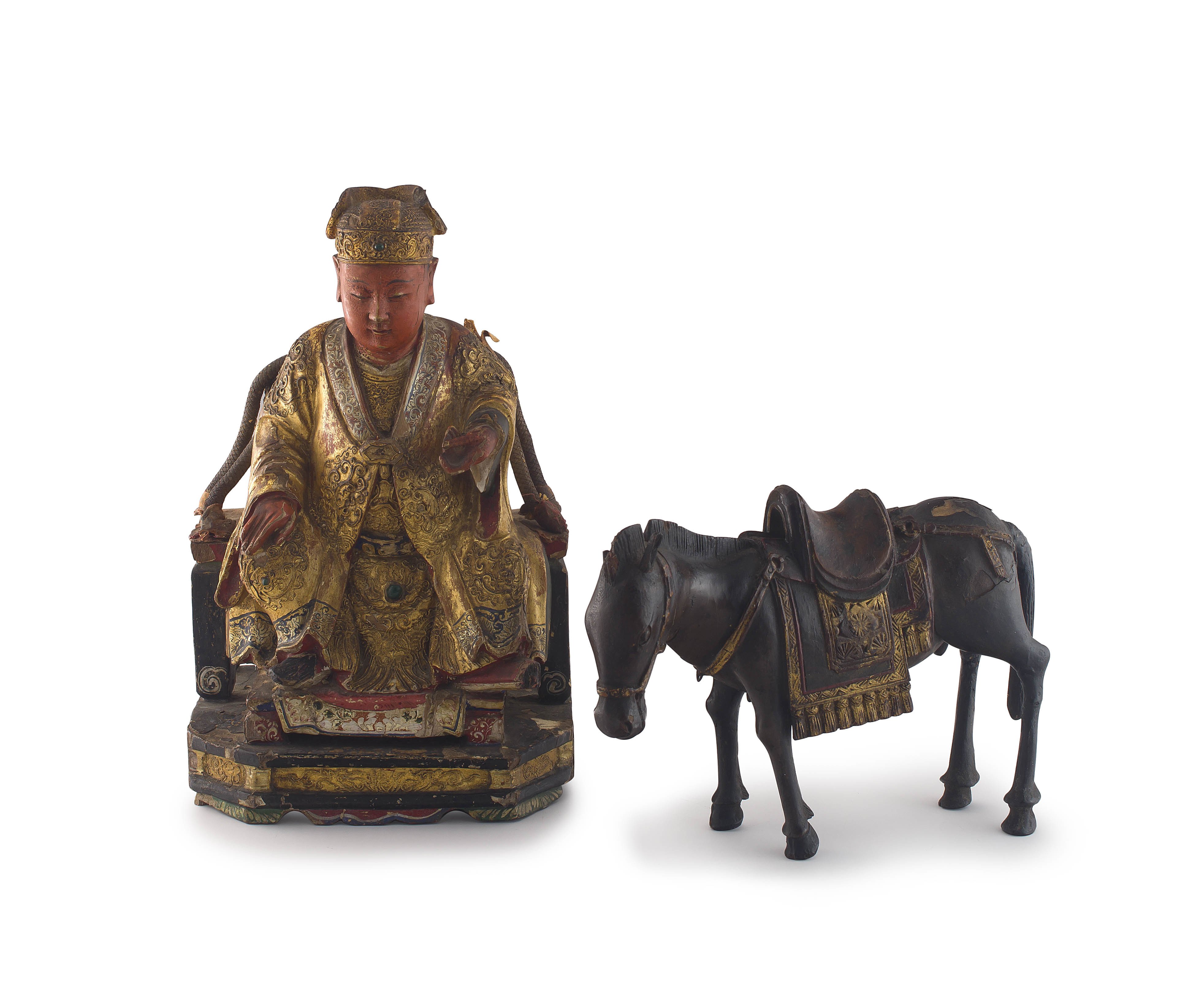 A Chinese wood and gilt-lacquer figure of a courtier, Qing Dynasty, 18th century