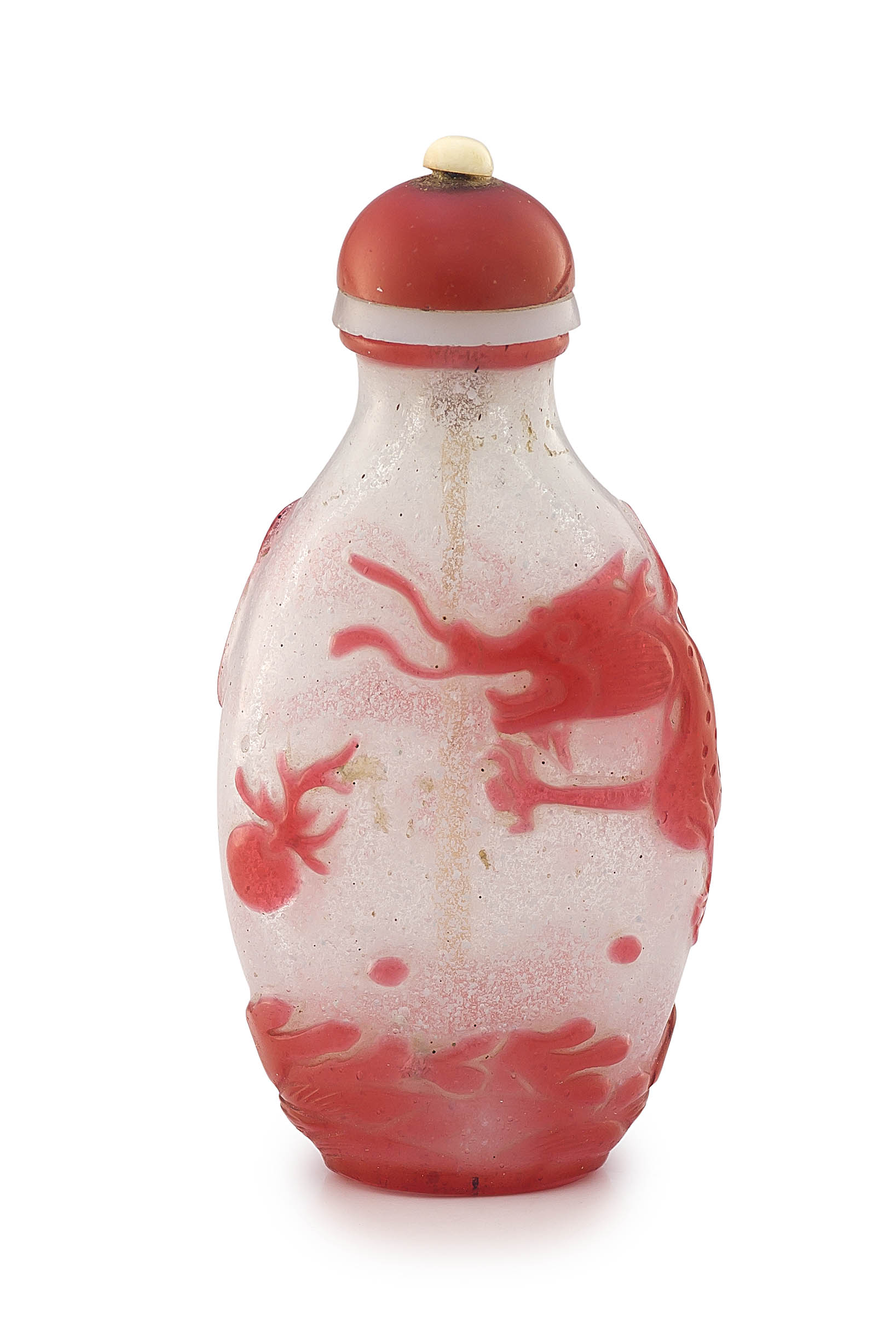 A Chinese single overlay red snowflake glass snuff bottle, Qing Dynasty, 19th century