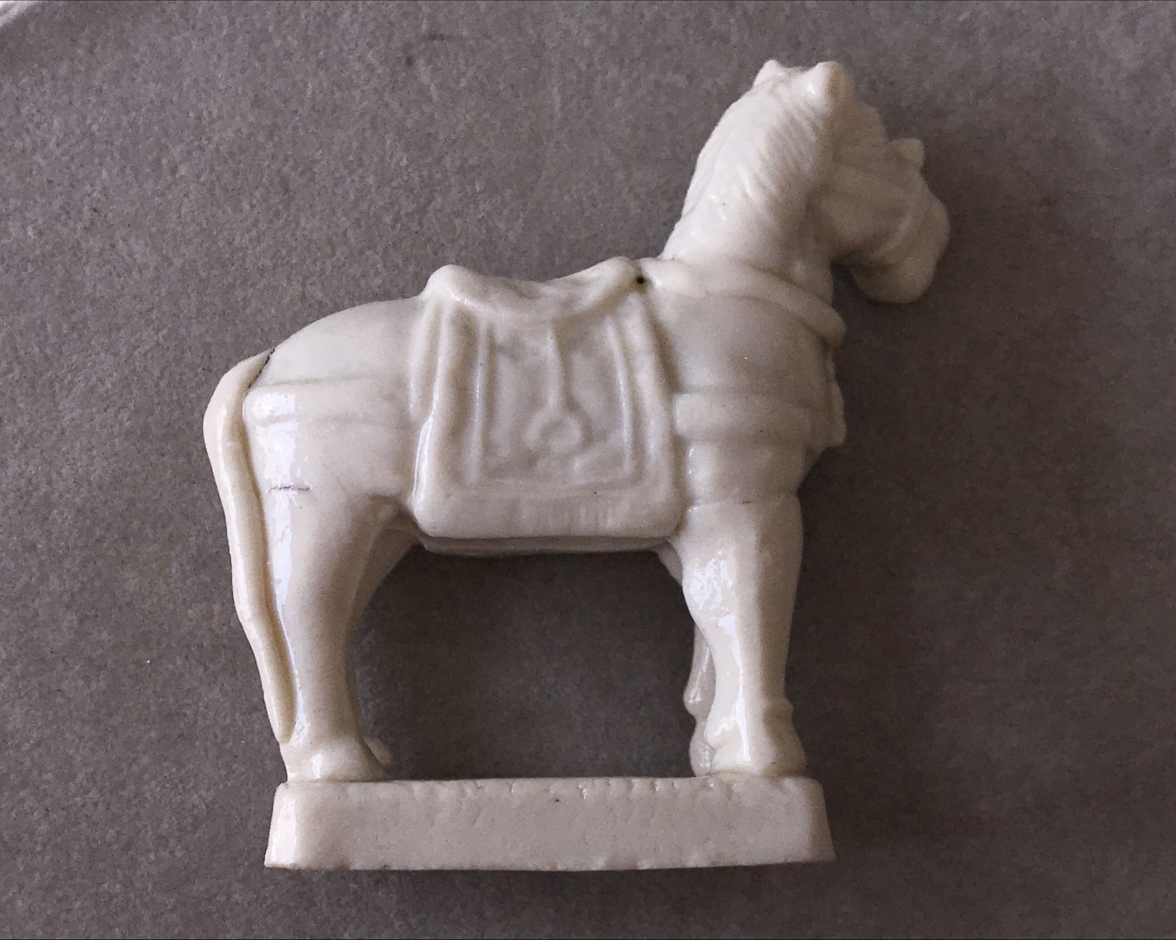 A Chinese blanc-de-chine figure of a horse, early 18th century