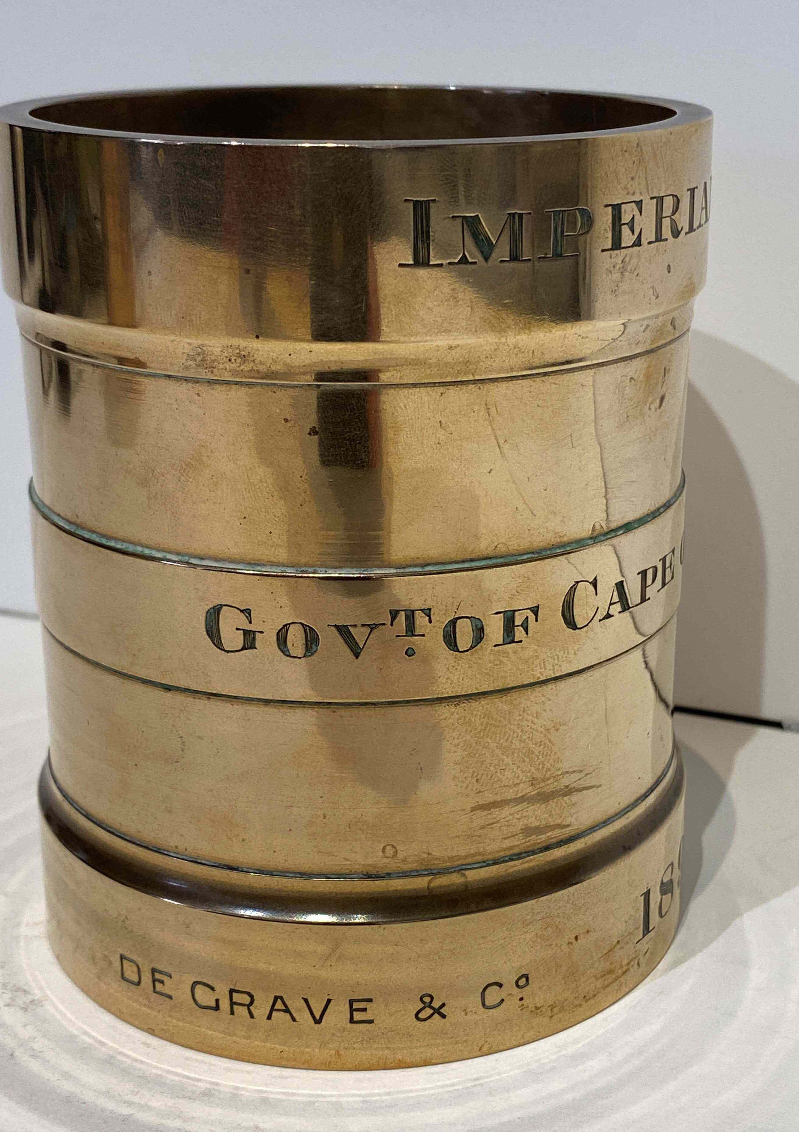 A Cape of Good Hope Imperial Pint brass measure, De Grave & Co, London, 1895