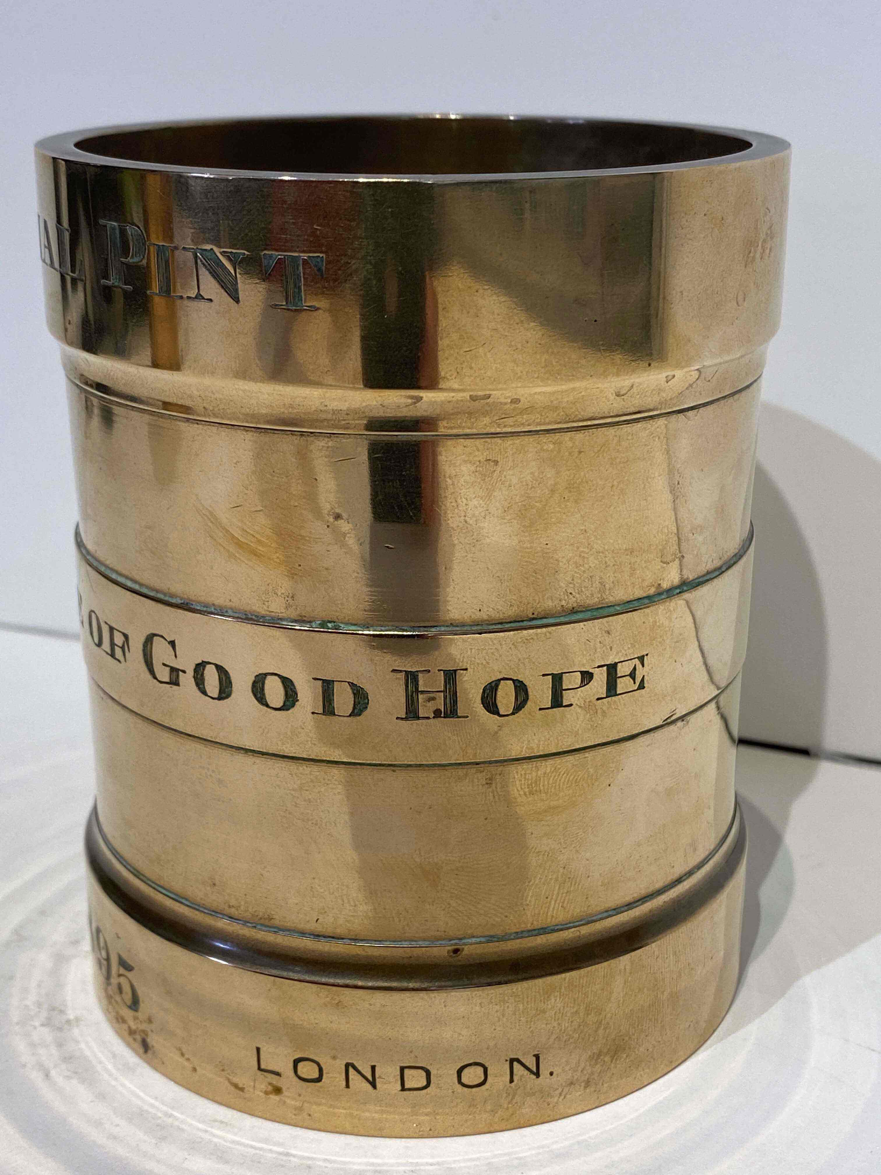 A Cape of Good Hope Imperial Pint brass measure, De Grave & Co, London, 1895