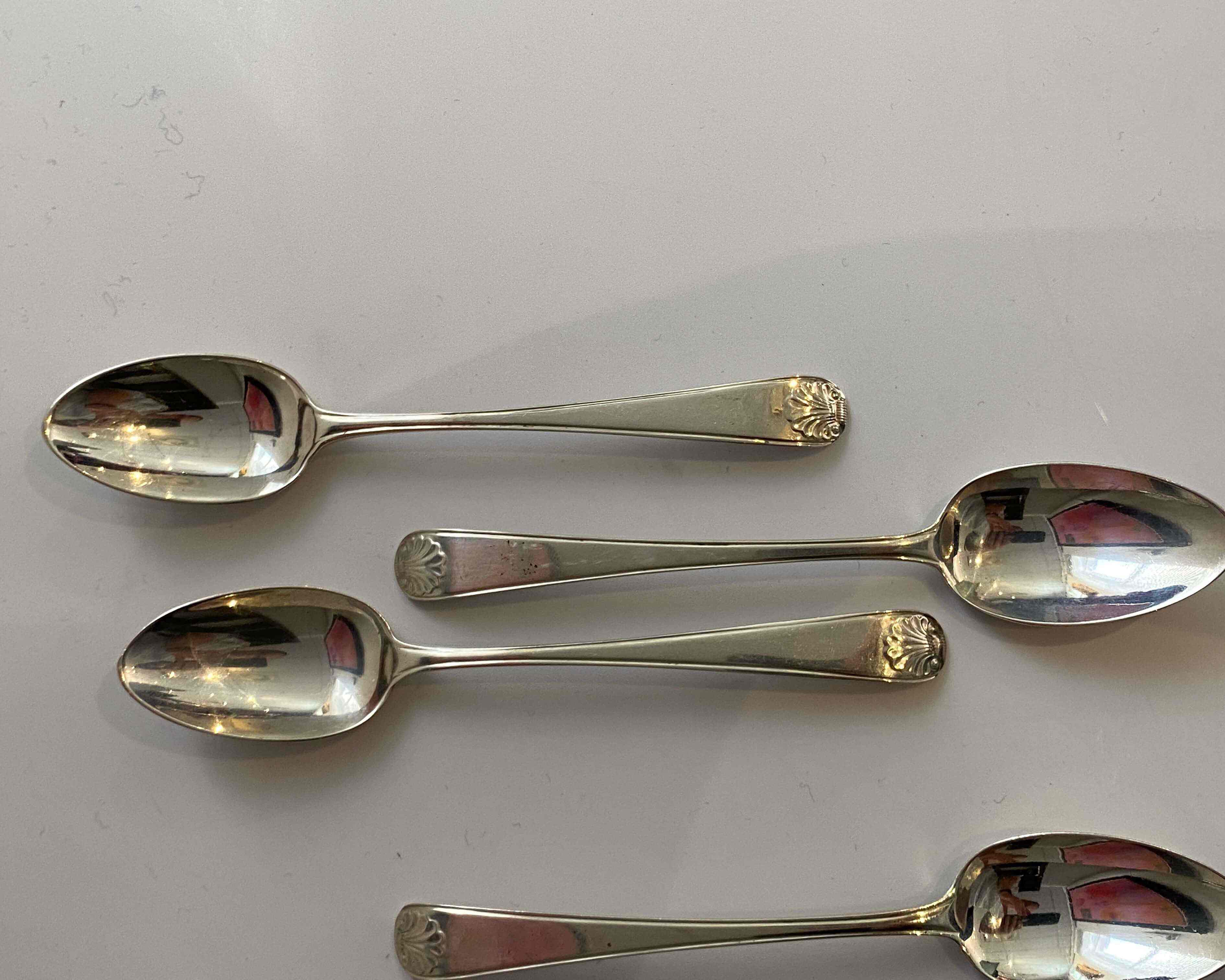 A George IV and William IV silver assembled 'Shell and Thread' pattern flatware service, William Eaton, London, 1825-1837