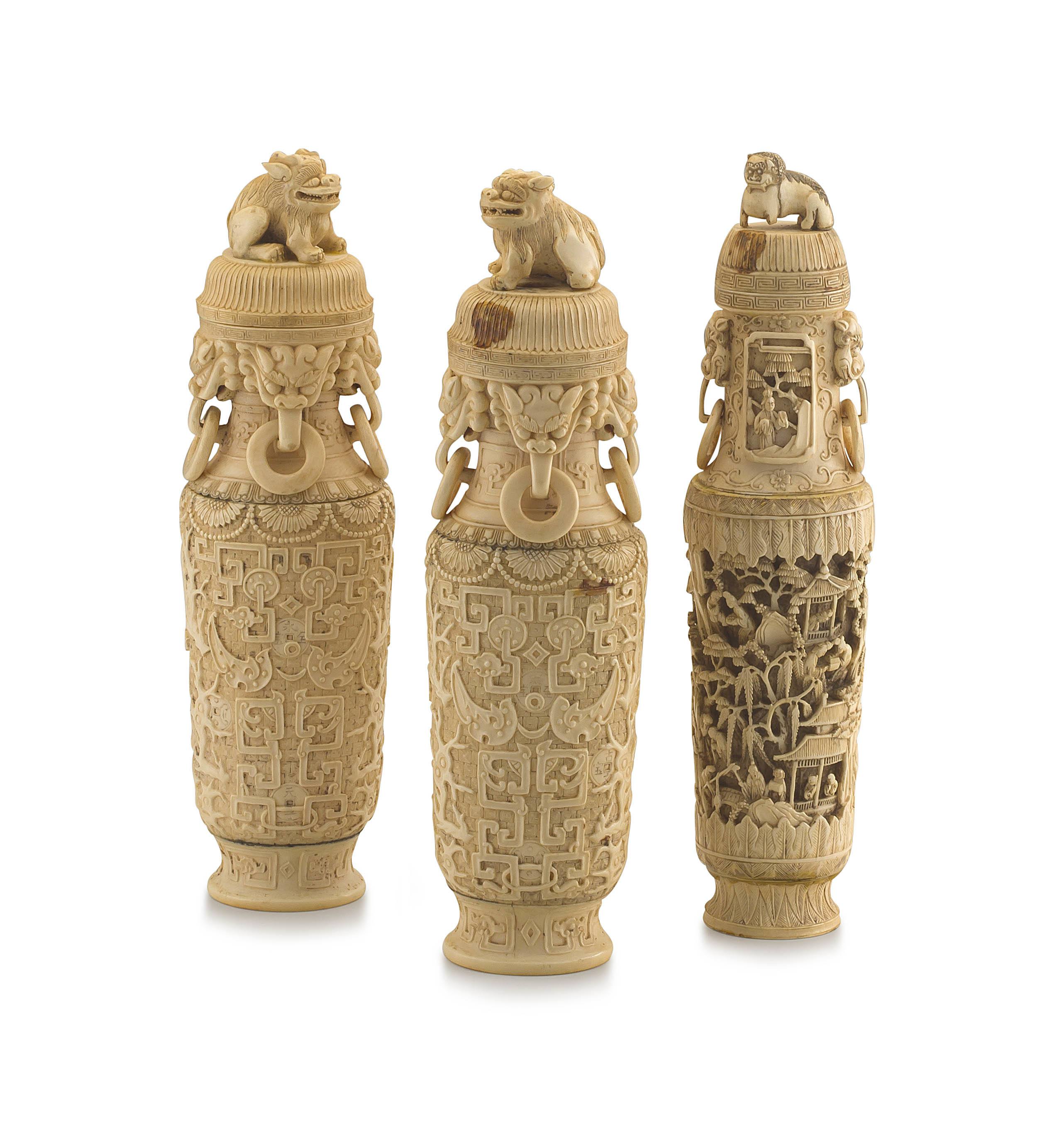 A pair of Chinese ivory vases and covers, 20th century