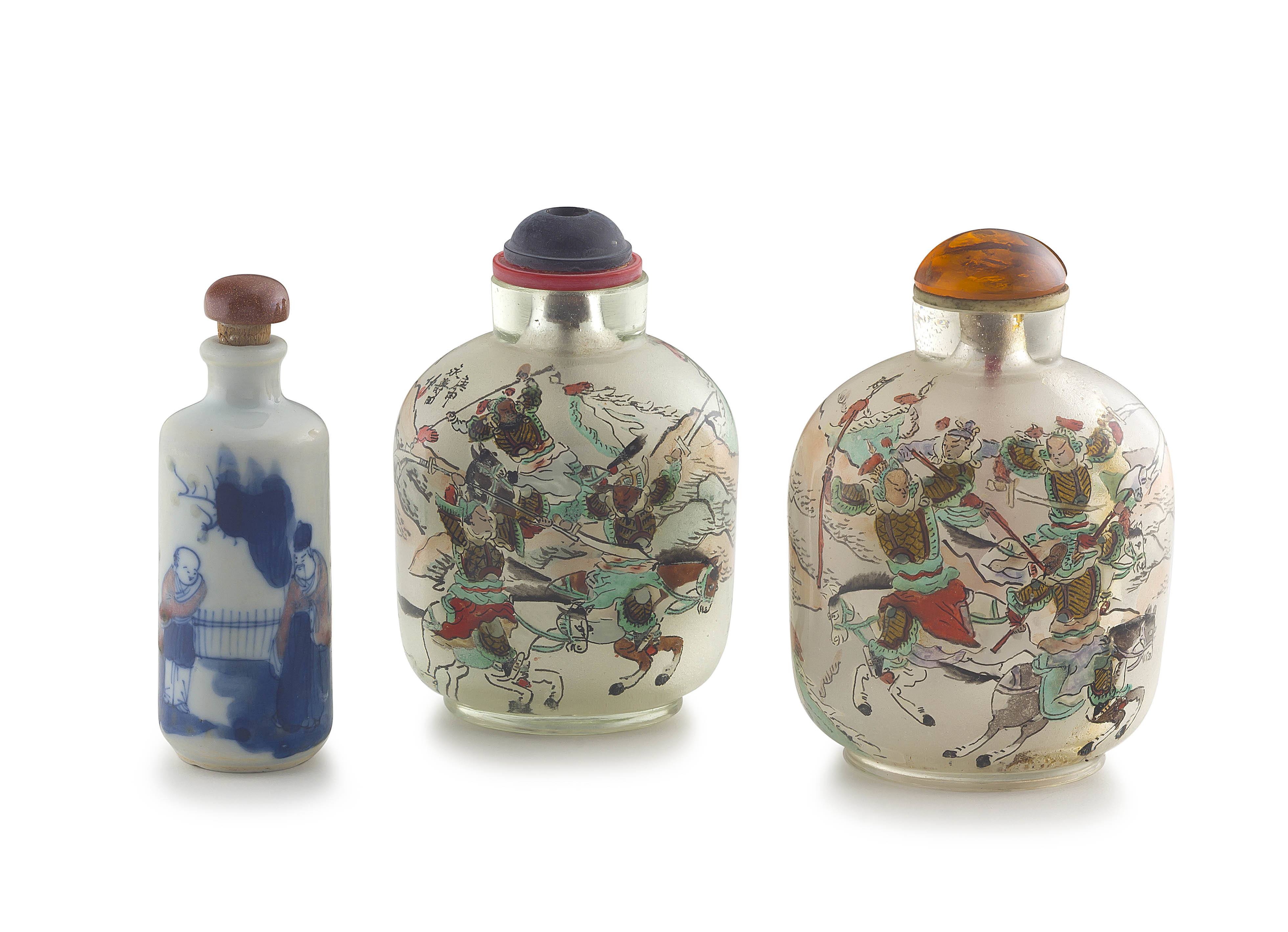 A pair of Chinese reverse painted glass snuff bottles, 20th century
