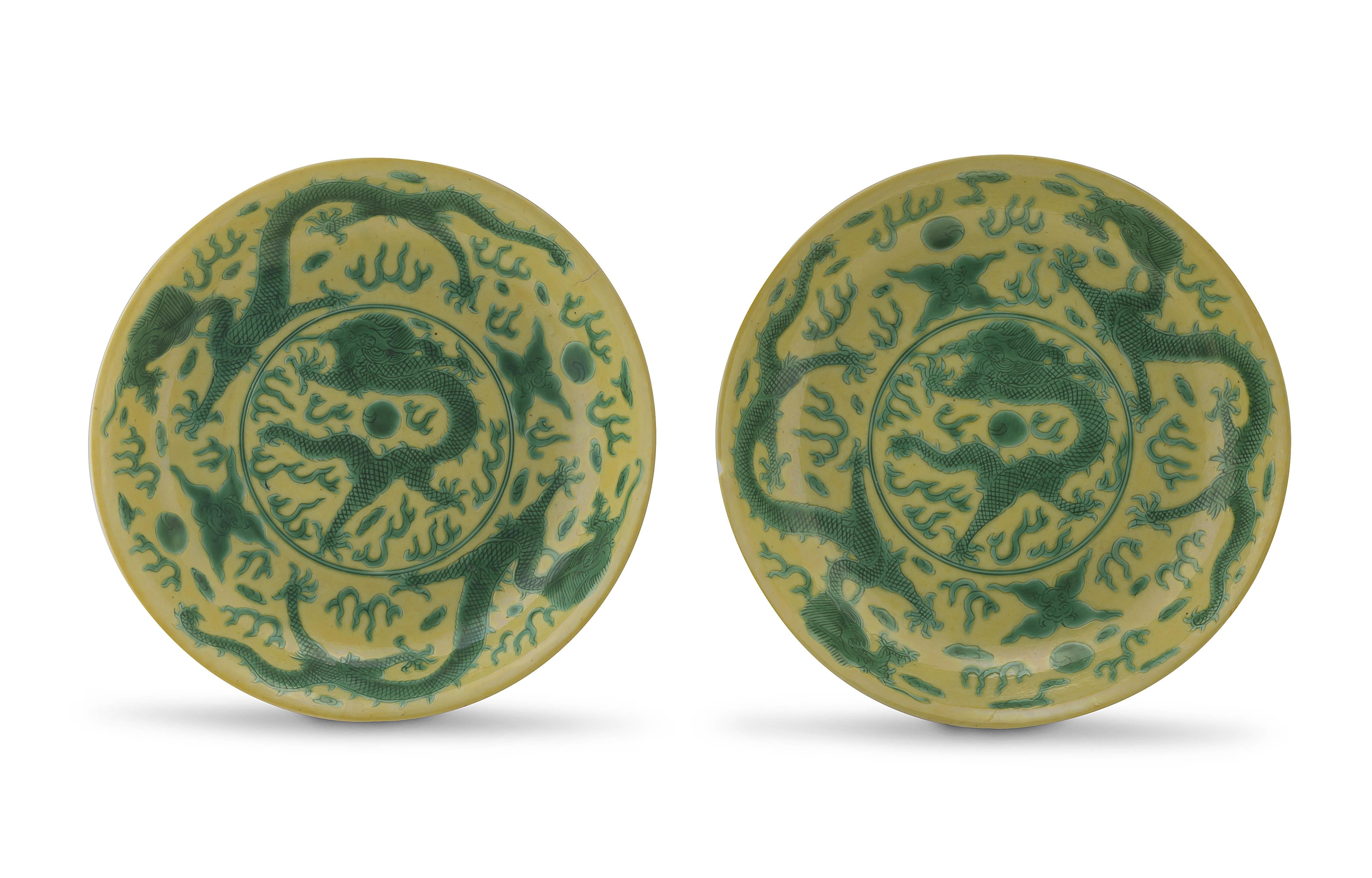 A pair of Chinese yellow and green enamelled dragon dishes, Qing Dynasty, late 19th century