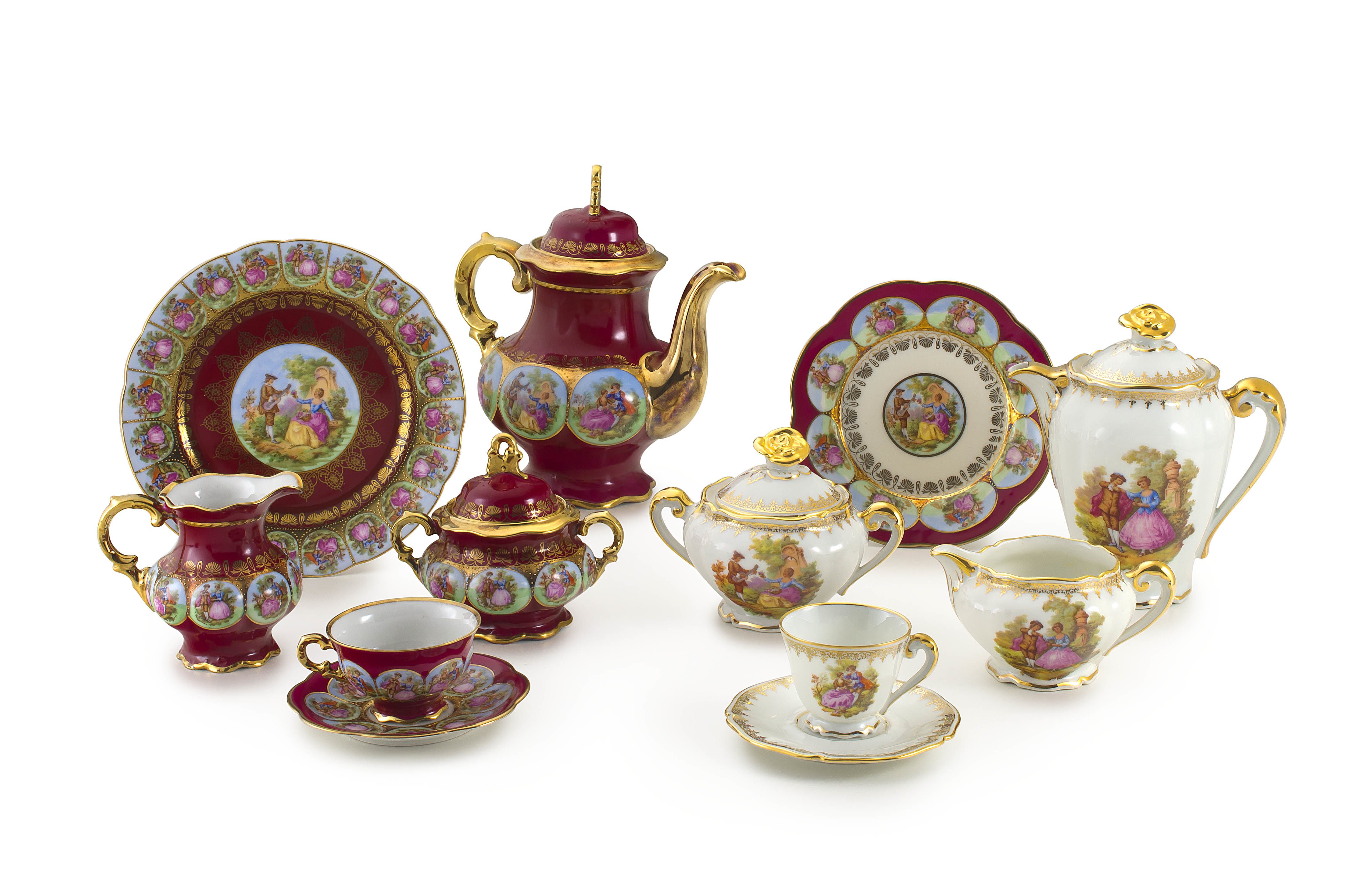 A Hutschenreuther maroon and gilt part coffee set, mid 20th century