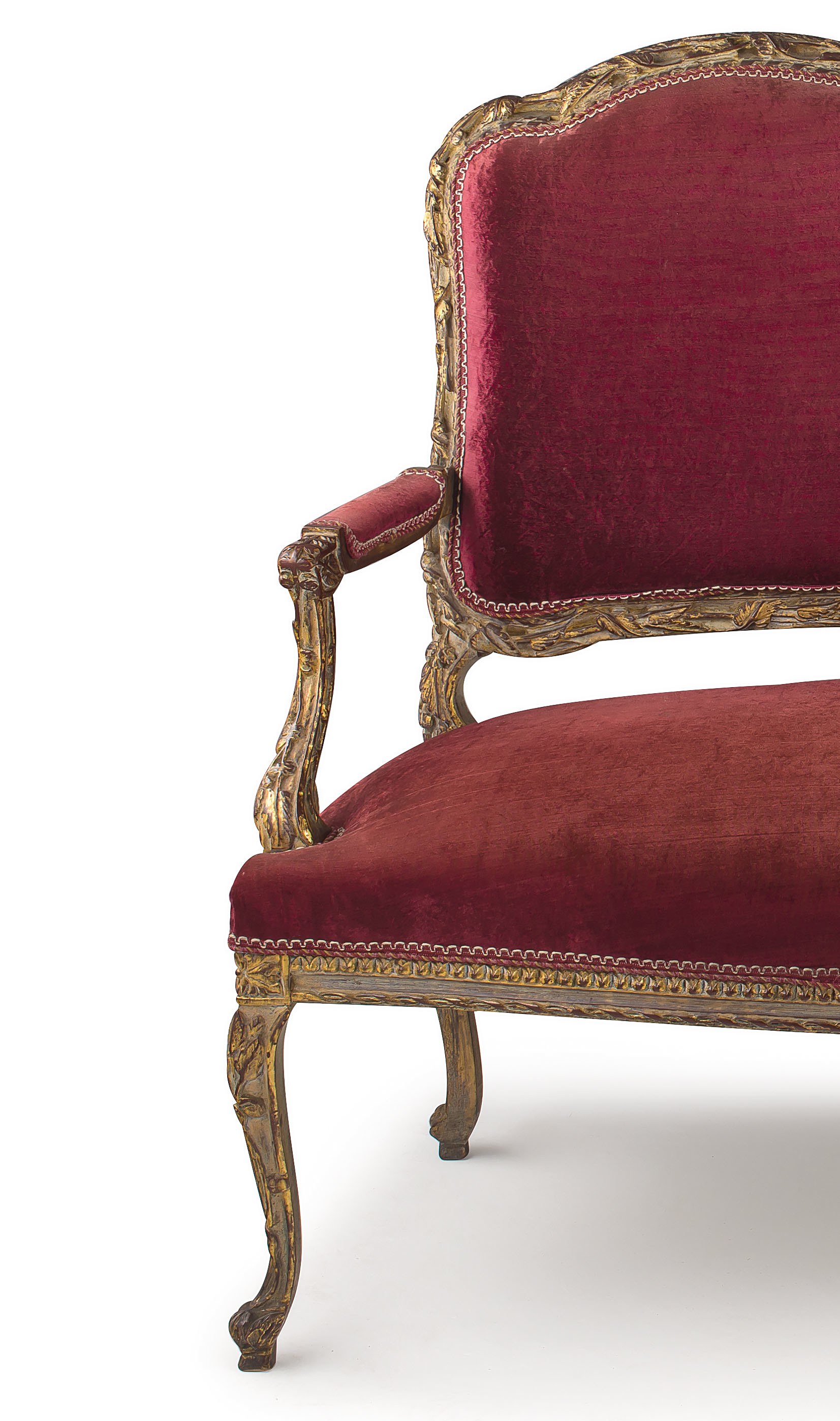 A Louis XVI style gilded and upholstered settee