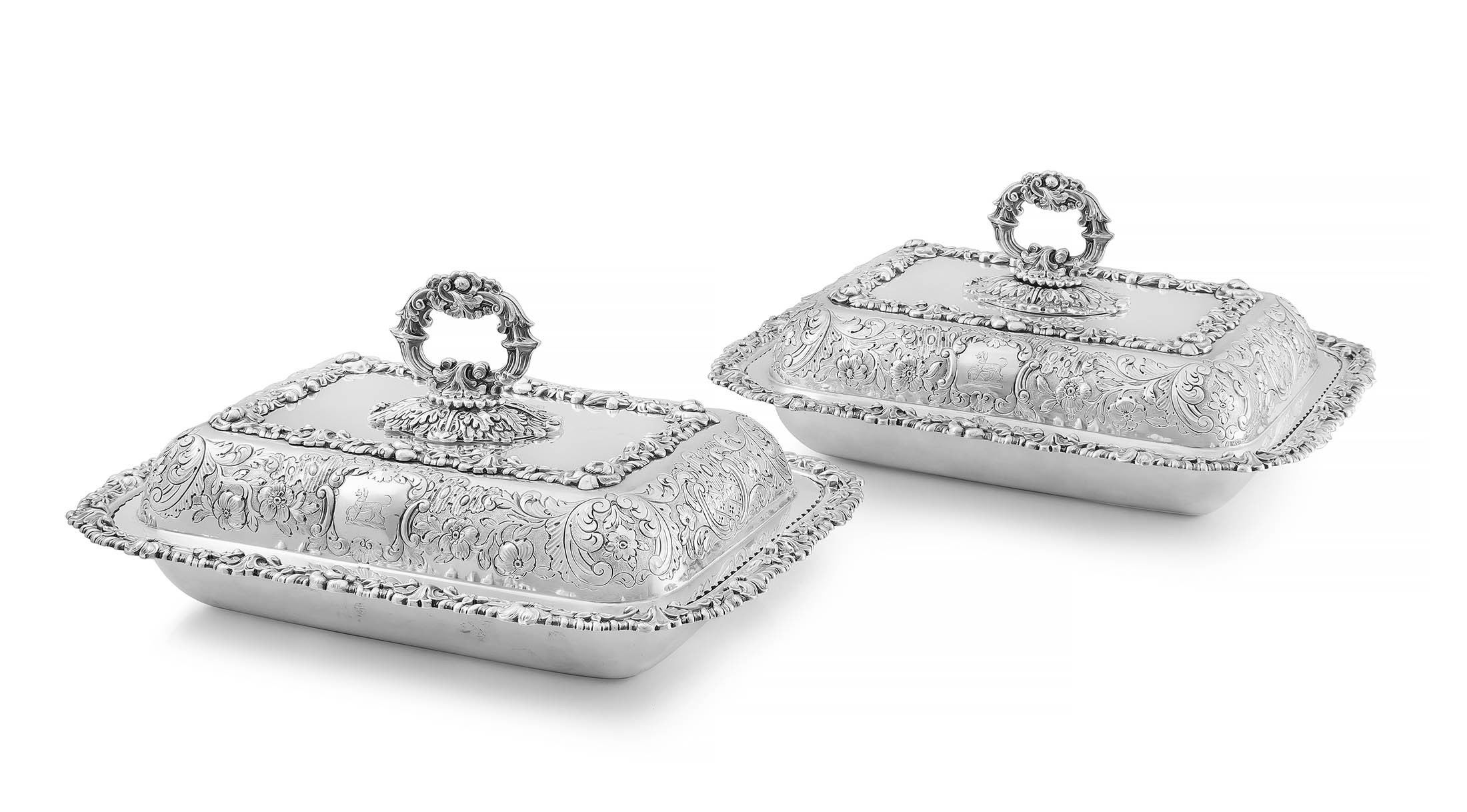 A pair of George IV silver entrée dishes and covers, maker's initials RG, Sheffield, 1820
