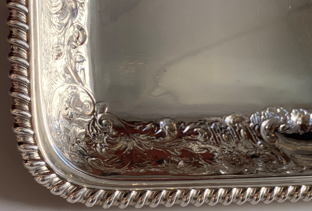 A pair of George IV silver entrée dishes and covers, maker's initials RG, Sheffield, 1820