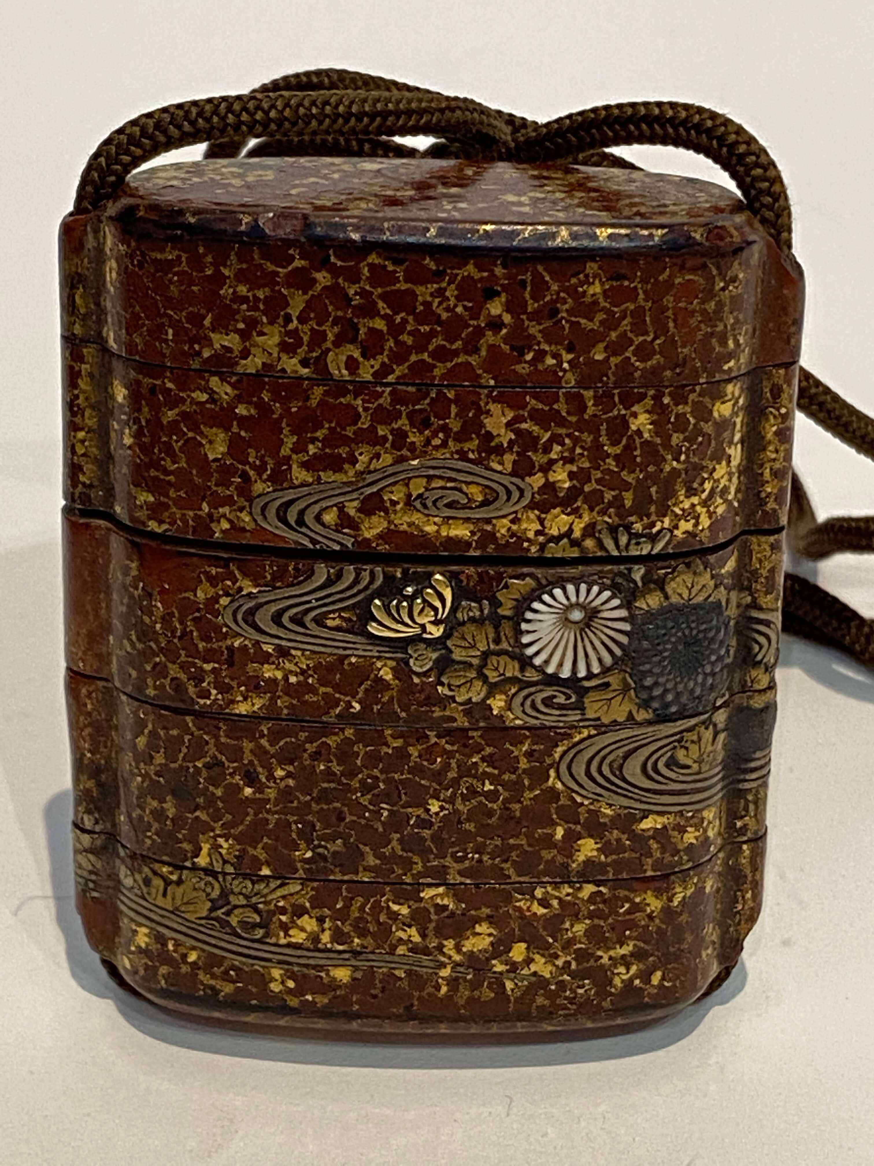 A Japanese hardwood case inro, 19th century