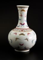 A Chinese 'Famille-Rose' 'butterfly' bottle vase, six-character mark and period of Guangxu (1875-1908)