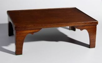 A mahogany bed table, 19th century