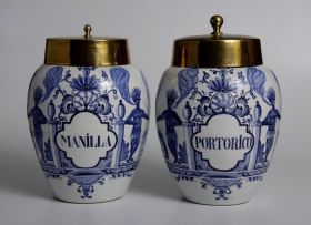 A pair of Dutch Delft blue and white tobacco jars, De Porceleyne Klaeuw, 19th century