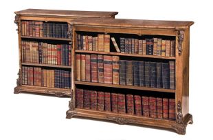 A pair of Victorian walnut and inlaid open bookcases, circa 1880