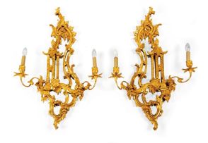 A pair of George II style giltwood two-light girandoles