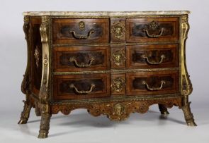 A Régence style kingwood, walnut, marquetry, marble-topped and gilt-metal mounted commode