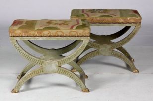 A pair of green-painted X-frame stools, similar to the preceding lot