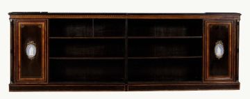 A pair of Victorian ebonised, bird's-eye maple and porcelain mounted open bookcases