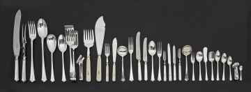 An extensive canteen of silver 'Chippendale' pattern cutlery, Elkington & Company, 1934-1940
