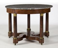 An Empire mahogany, gilt-metal mounted and marble-topped centre table, first quarter 19th century