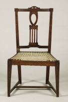 Two Cape neo-classical stinkwood fiddleback side chairs, late 18th century
