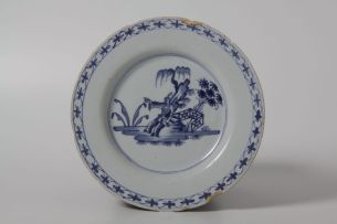 An English delftware blue and white plate, mid 18th century