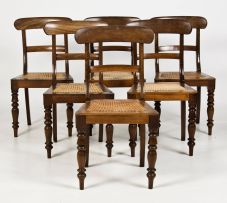 A set of six Cape stinkwood and caned dining chairs, 19th century