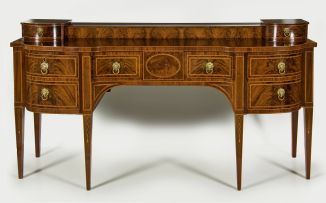 A George III mahogany and inlaid sideboard