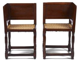 A pair of Cape teak and caned corner chairs, 18th century