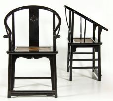 A pair of Chinese black lacquer horse-shoe chairs, 19th century