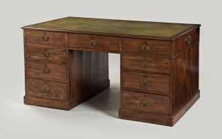 A George III mahogany double sided library desk