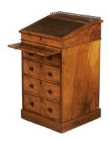 A mid Victorian walnut davenport, C Hindley & Sons, London